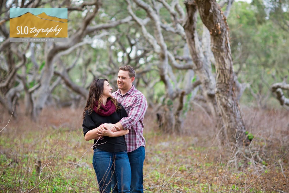 Couple surrounded by trees in los osos california