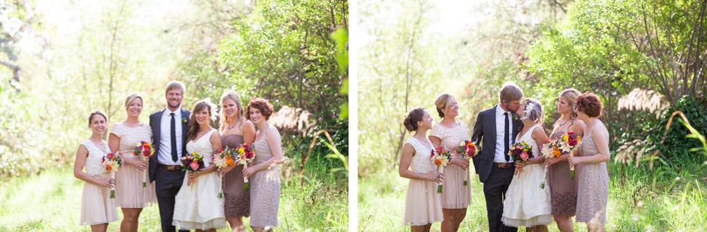 bridesmaids look on as couple kisses