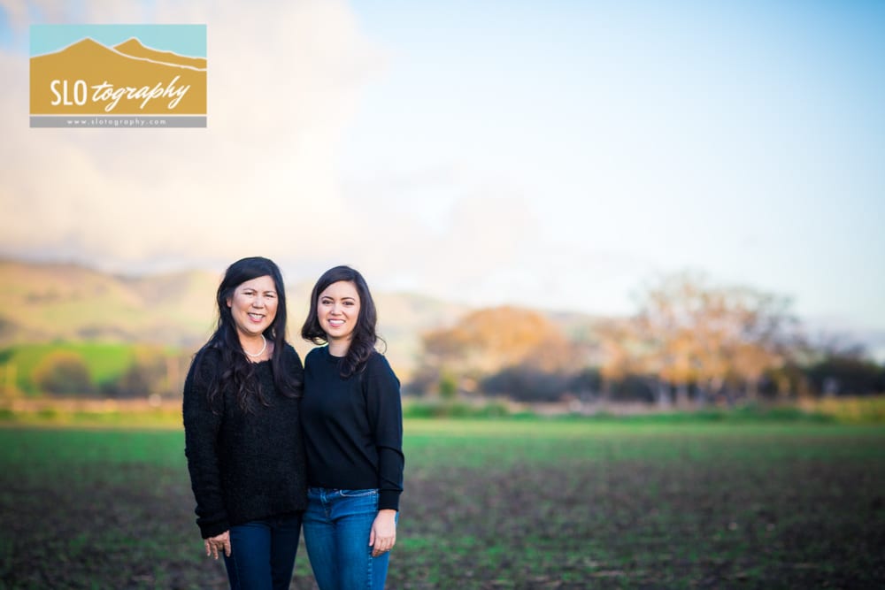 Mother and Daughter Portrait with Farm Background