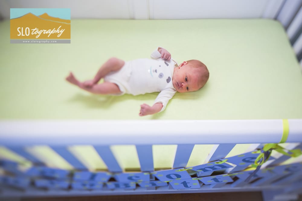 Portrait of Baby Boy in Crib