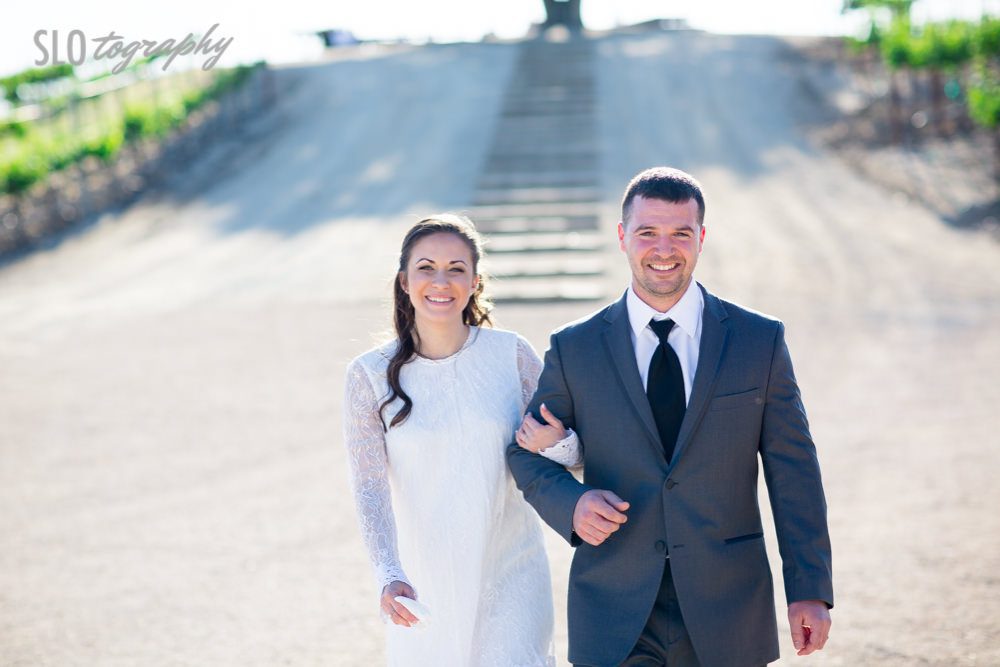 Newlyweds Walk Down the Hill at Pear Valley