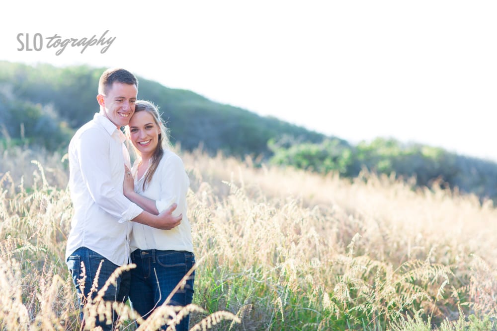 Couple in Jeans in the tall grass