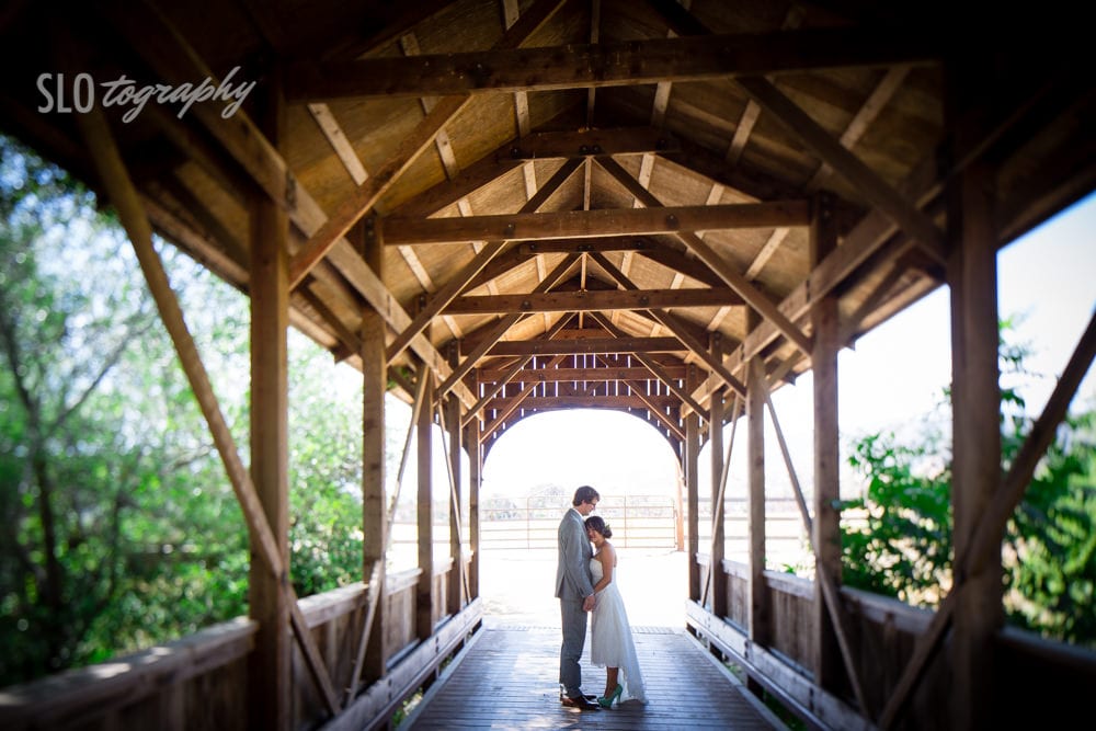 Bride and Groom on Covered Bridge